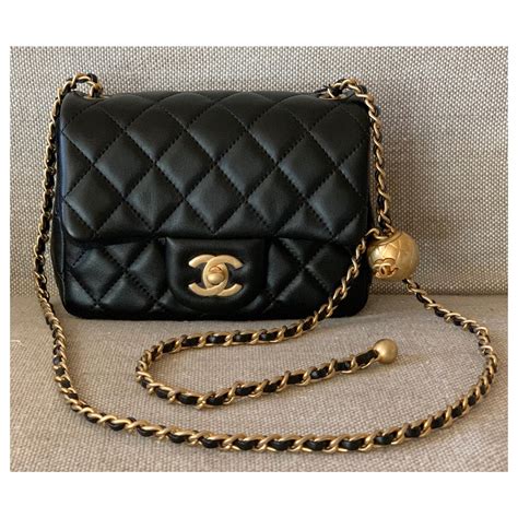 women's black chanel purse